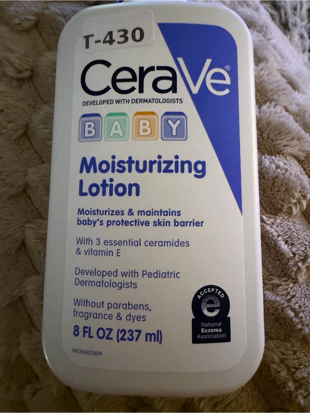 rave White & Blue Moisturizing Lotion Bottle